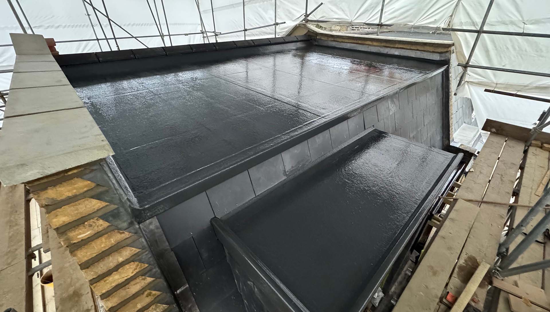 H95 Roofing blog feature image showing roofing maintenance work