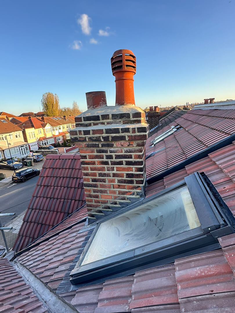 1f7c6717-5afe-4d63-9657-2ef82776df0d H95 Roofing project showing completed pitched roof on residential property